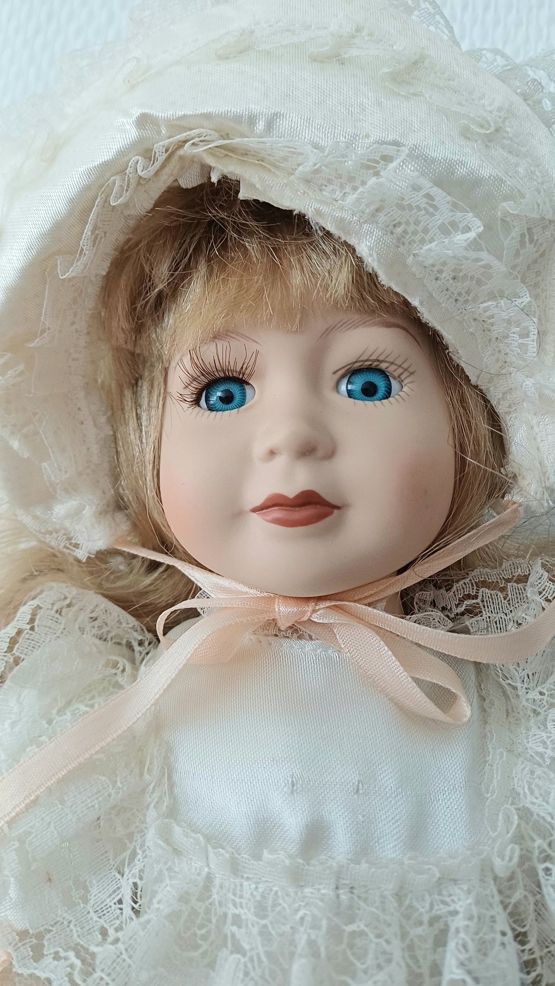 Poupée en porcelaine de collection