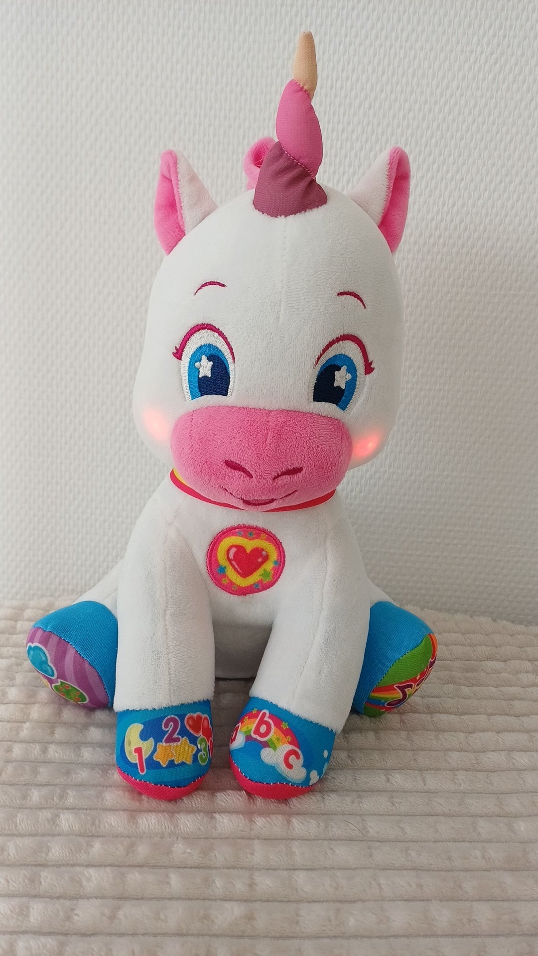 Peluche licorne interactive