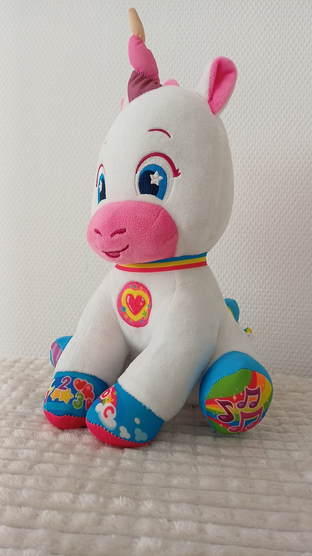 Peluche licorne interactive