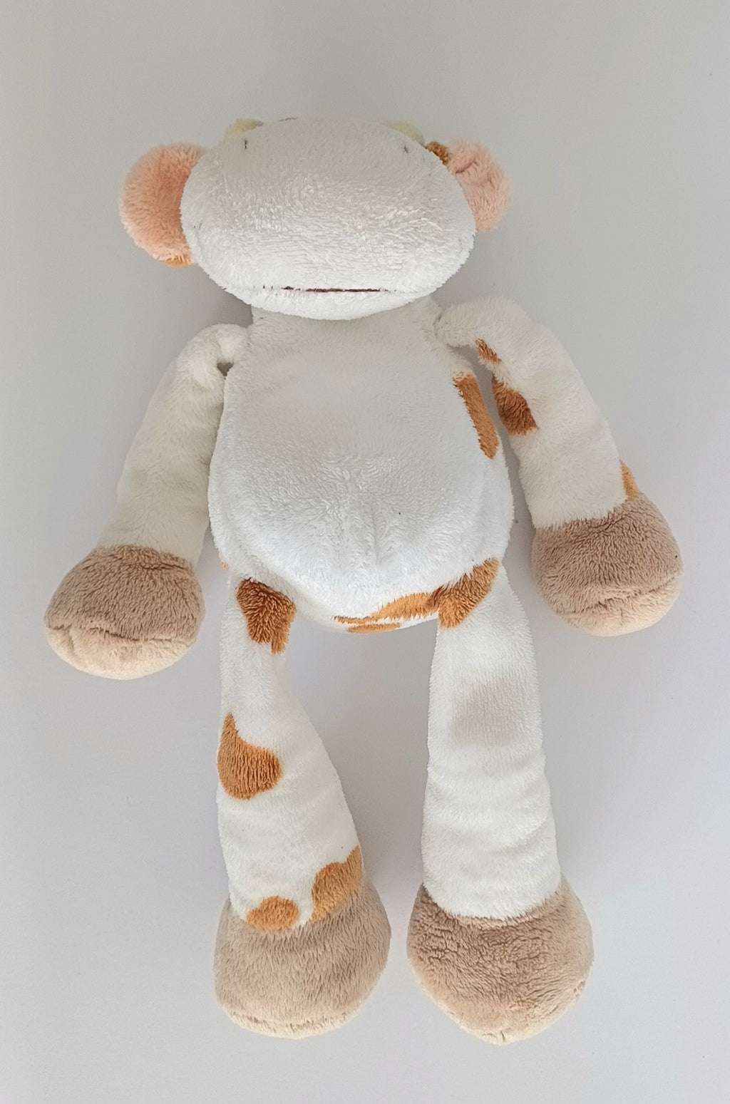 Doudou vache blanche et marron Nicotoy