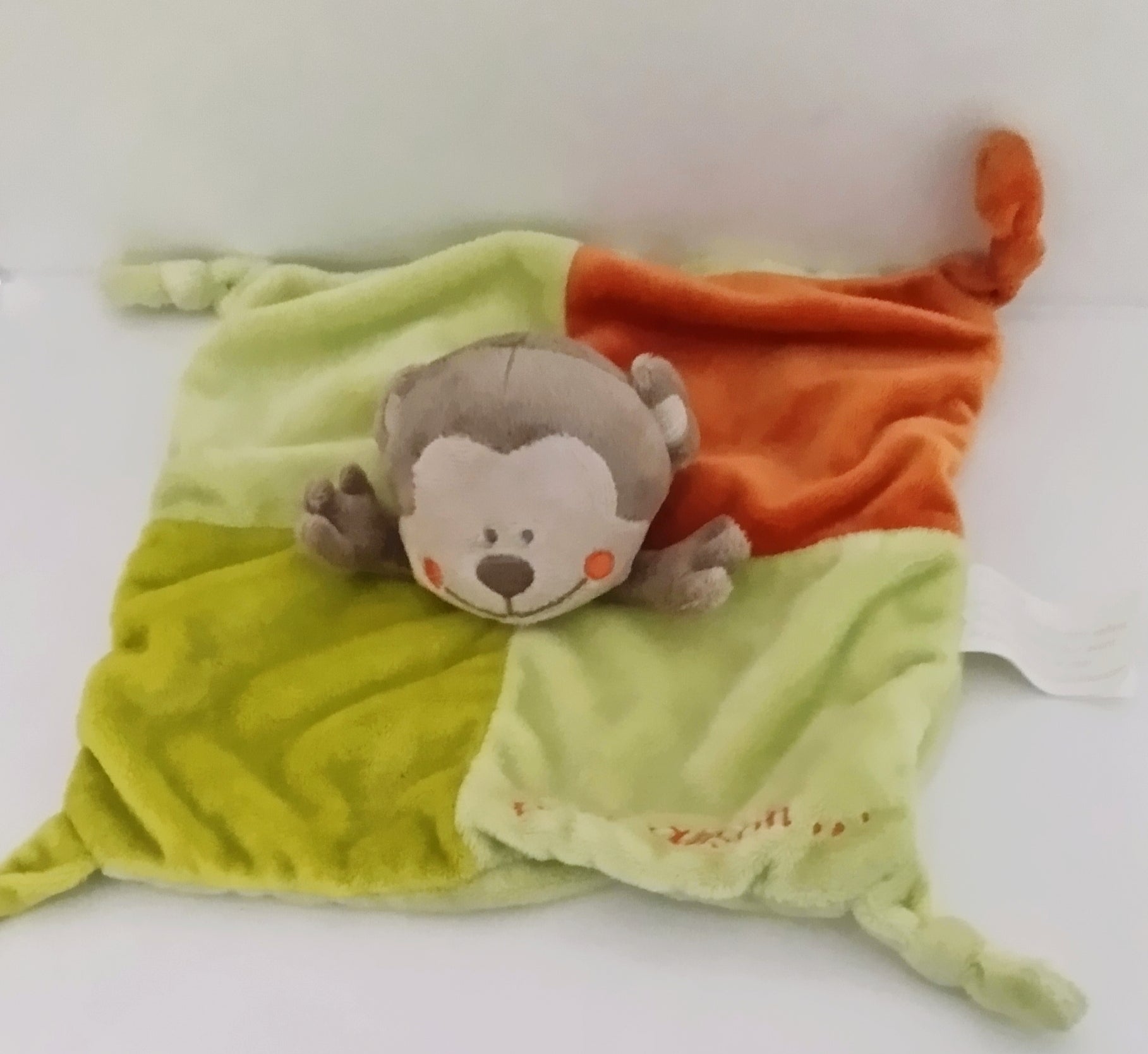 Doudou plat petit Ouistiti vert et orange KIMBALOO