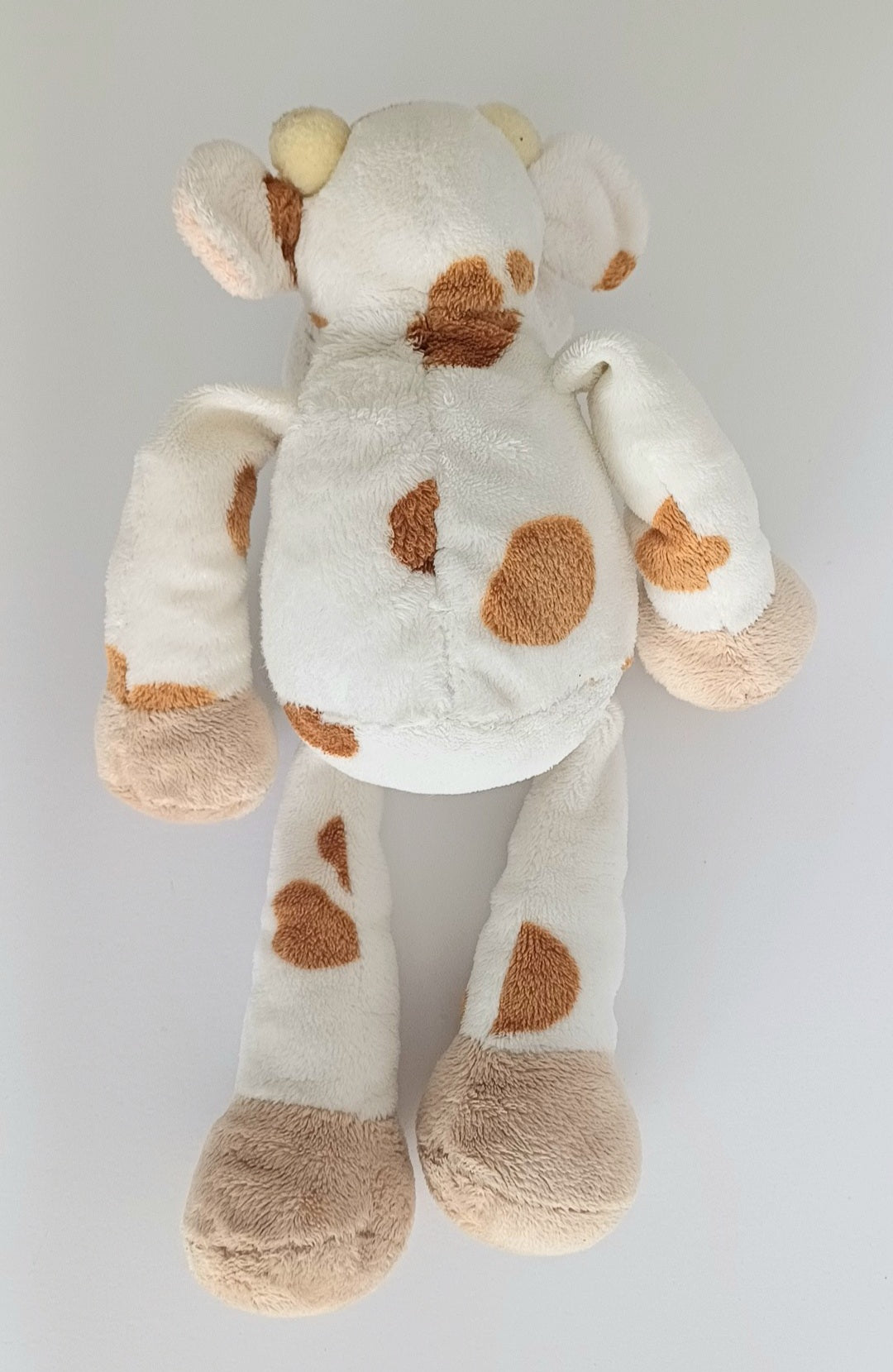Doudou vache blanche et marron Nicotoy